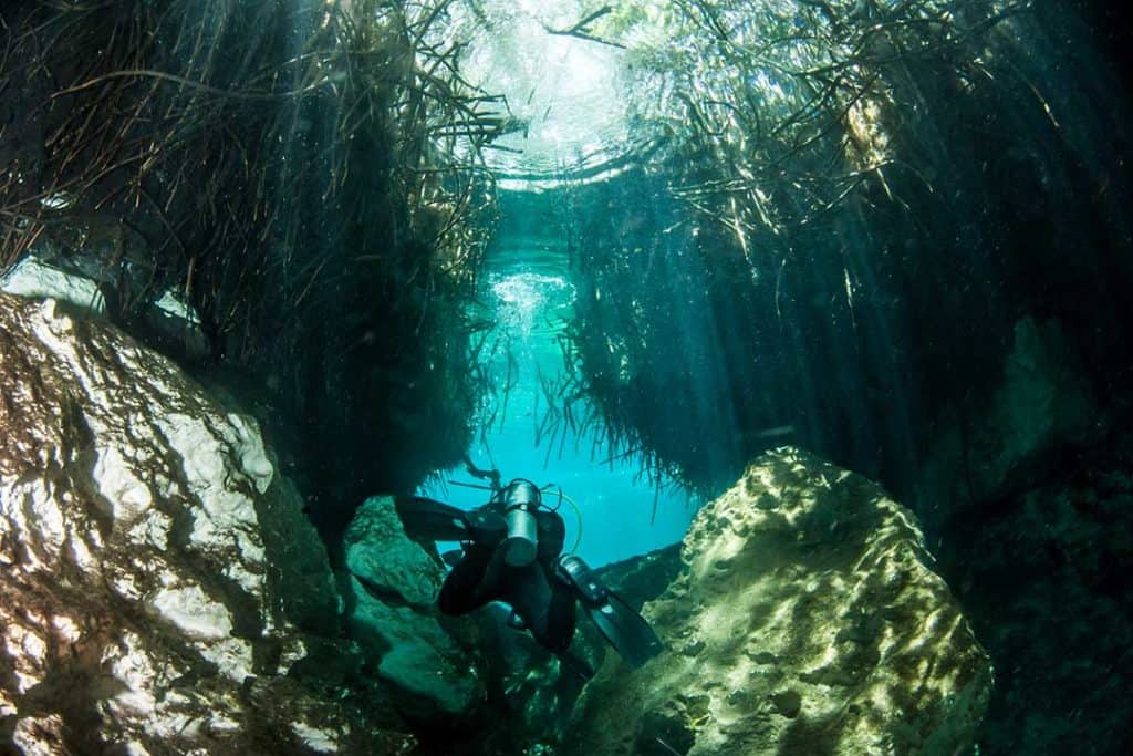 cave diver in casa cenote mexico