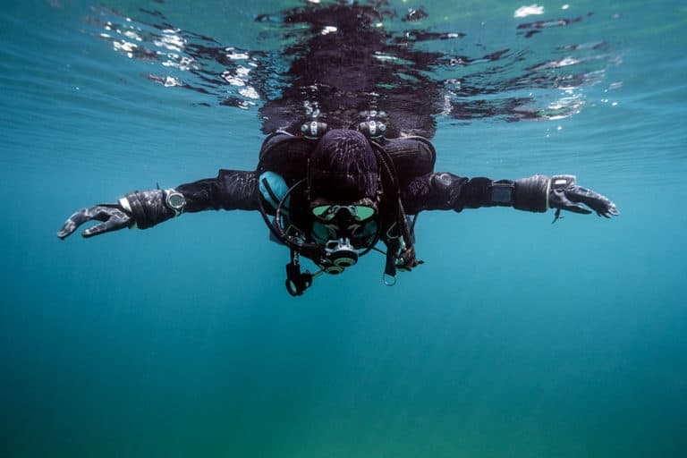 dry suit diver in cold water